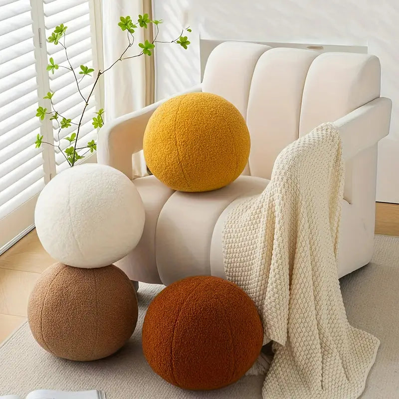 Oreiller en peluche en forme de boule